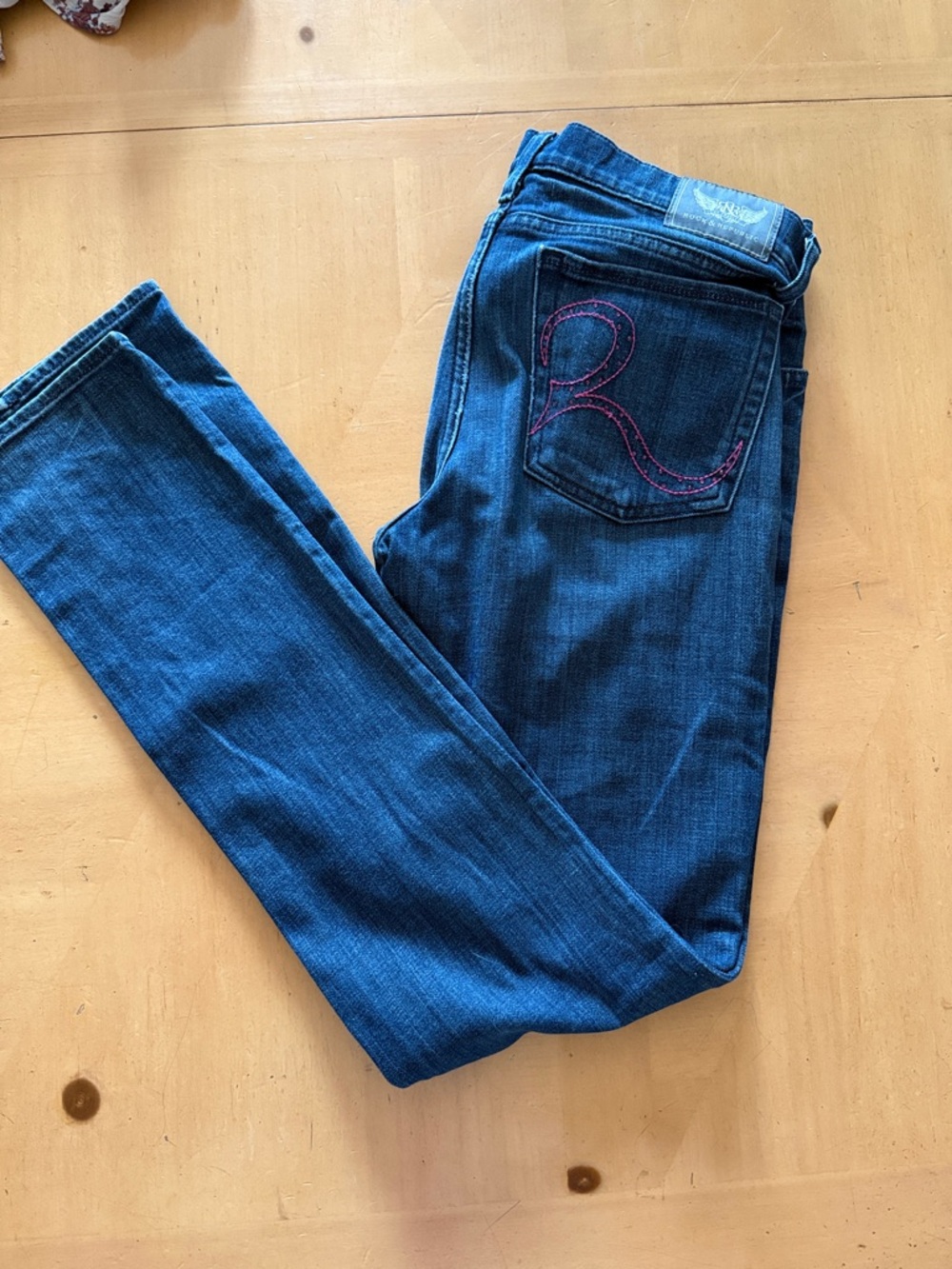 Rock and Republic Dark Blue Skinny Jeans with Pink Pocket Stitch and rhinestones